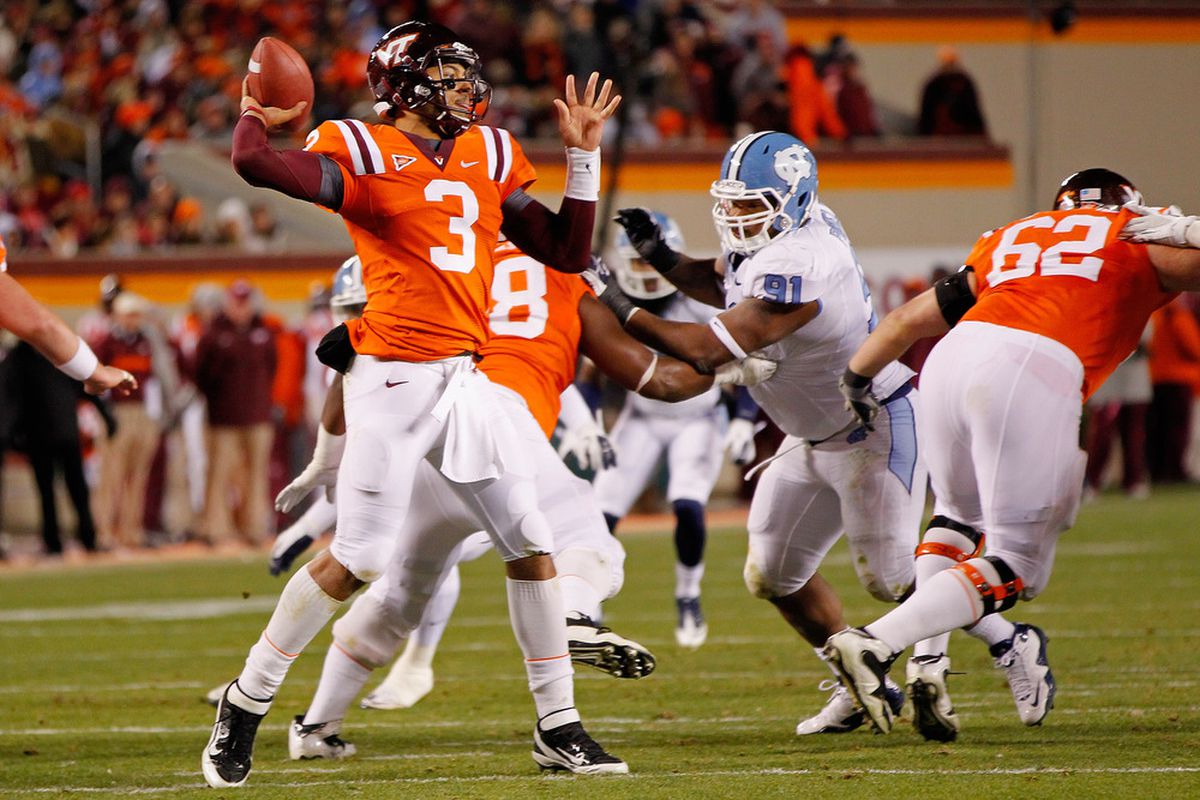 Tydreke Powell (#91) is shown here in 2011 about to level Virginia Tech's Logan Thomas. He may be about to do the same to UNC football and basketball.
