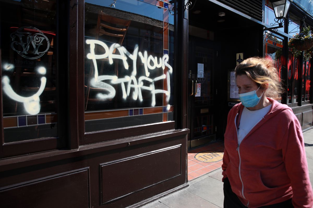 Coronavirus hits Wetherspoons staff: graffiti on a Wetherspoons pub in Crystal Palace