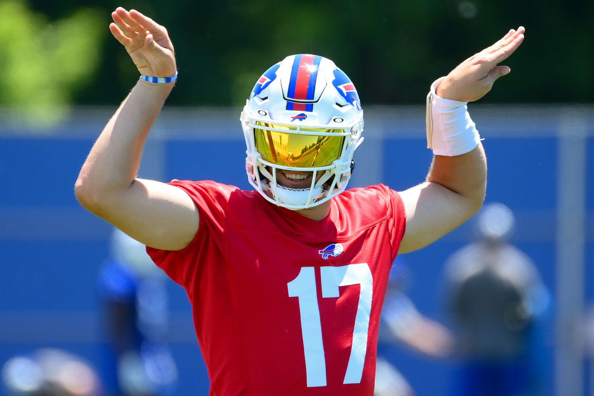 Buffalo Bills quarterback Josh Allen (17) gestures to his teammates during minicamp at the ADPRO Sports Training Center.