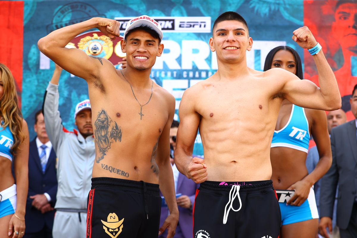 Emanuel Navarrete (L) and Eduardo Baez (R) pose during the weigh-in ahead of their WBO featherweight championship fight at Pechanga Arena on August 19, 2022 in San Diego, California.