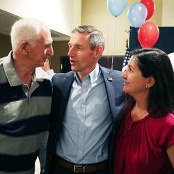 State Rep. Mike Kennedy, R-Alpine, center, talks with Jim Tilson and Dani Palmer after he conceded to Mitt Romney in Lehi on Tuesday, June 26, 2018, during the Republican primary election for U.S. Senate.