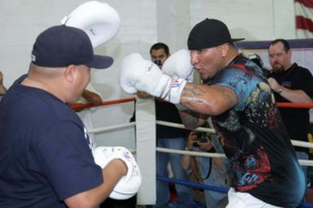 If Arreola were really in that great of shape, he wouldn't be hiding his boobies with a t-shirt.  