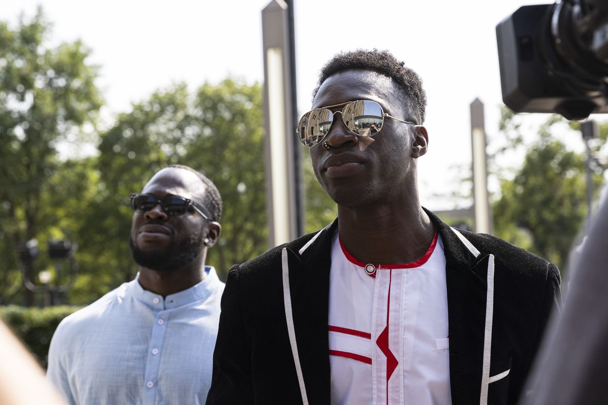 Brothers Olabinjo Osundairo, left, and Abimbola Osundairo, right arrive at Cook County Criminal Courthouse in Little Village, Wednesday, July 14, 2021. 