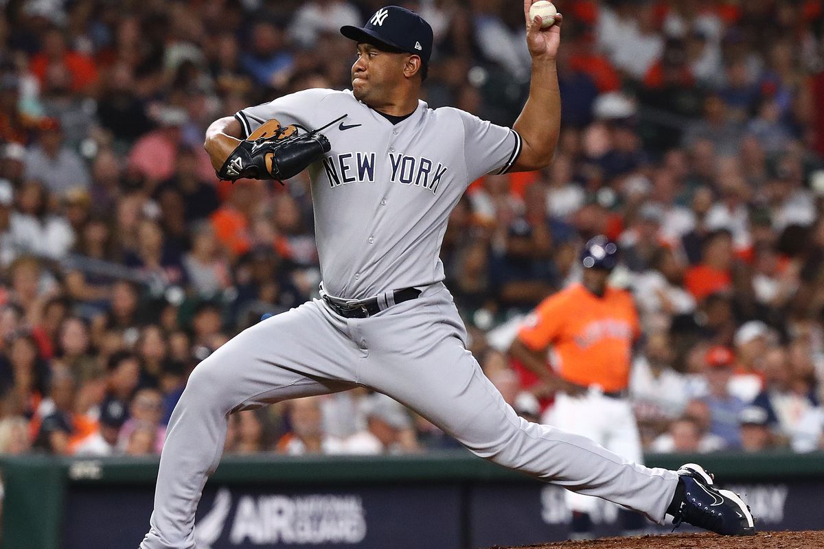 Wandy Peralta of the New York Yankees pitches in the eighth inning against the Houston Astros at Minute Maid Park on September 01, 2023 in Houston, Texas.