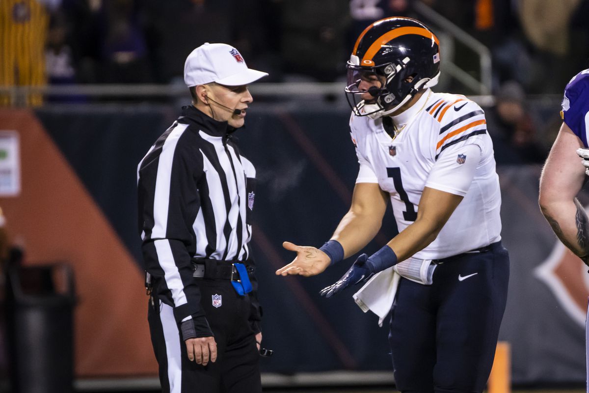 Bears quarterback Justin Fields argues with an official during the fourth quarter of Monday’s loss to the Vikings. 