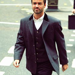 FILE - In this Oct. 28, 1993, file photo, pop star George Michael arrives to give evidence at the Royal Courts of Justice in London. Michael was petitioning the court to release him from his contract with Sony Music Entertainment (UK) Ltd. Michael, who rocketed to stardom with WHAM! and went on to enjoy a long and celebrated solo career lined with controversies, has died, his publicist said Sunday, Dec. 25, 2016. He was 53. 