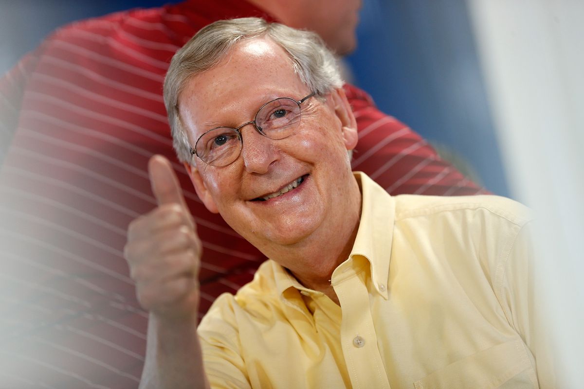 Mitch McConnell smiling