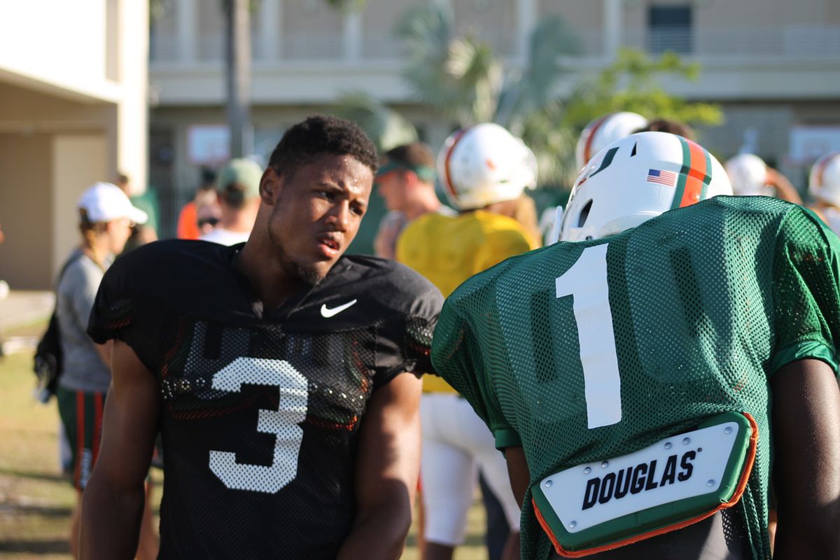Tracy Howard and Artie Burns discussing secondary stuff