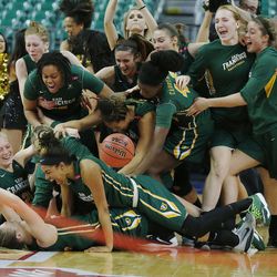 The San Francisco Lady Dons celebrate the win over Brigham Young Cougars during the WCC tournament championship in Las Vegas Tuesday, March 8, 2016. San Francisco won 70-68. 