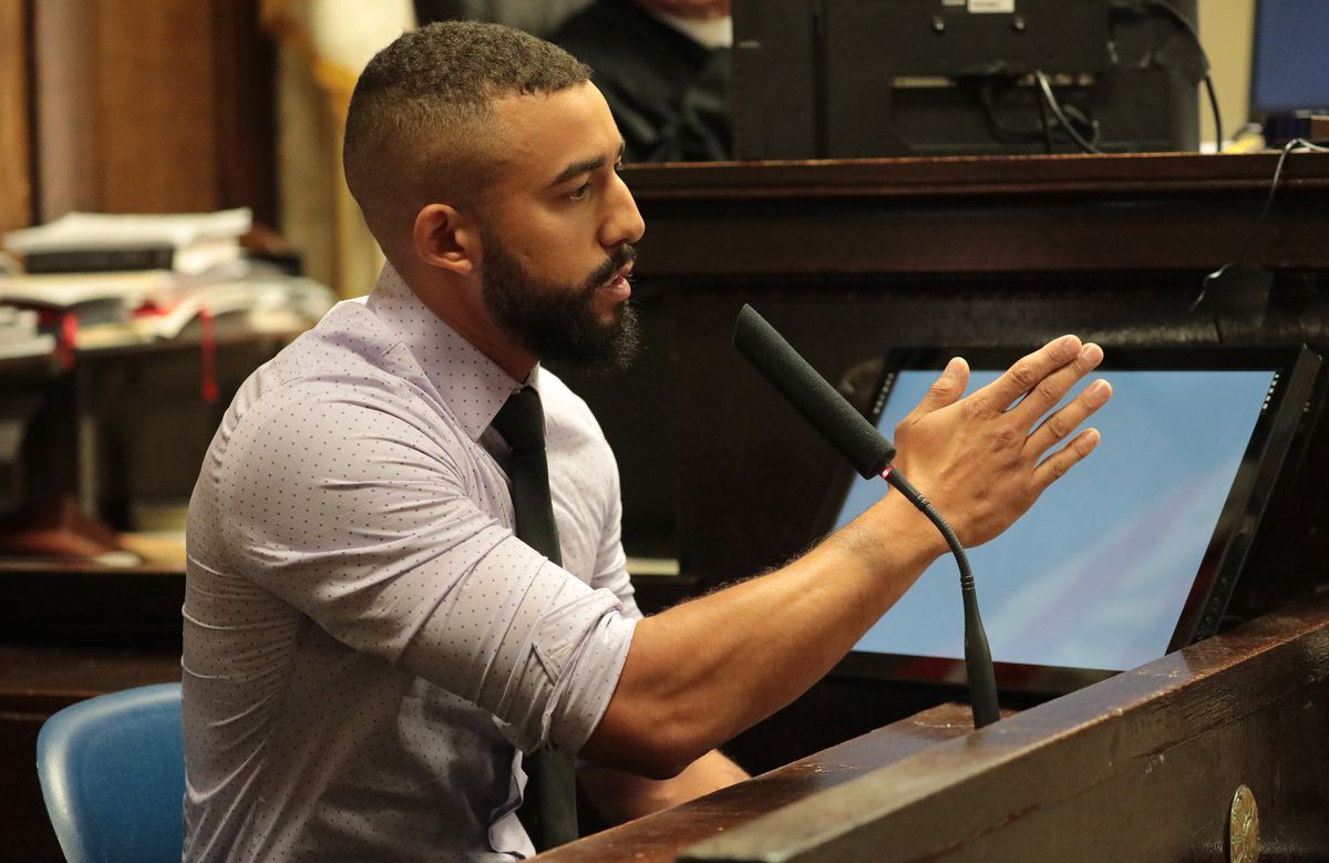 Xavier Torres testifies from the witness stand during the trial for the shooting death of Laquan McDonald at the Leighton Criminal Court Building on Tuesday. Torres said he heard gunshots and saw Laquan McDonald fall to the street, followed by a pause and
