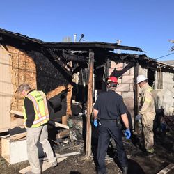 Firefighters review burned areas of a home at 75 S. 1000 West on Tuesday, Oct. 30, 2018. The Provo Fire Department said the blaze caused an estimated $80,000 to $100,000 in damage and displaced a family of four.