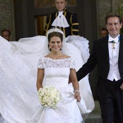 Sweden's Princess Madeleine and Christopher O'Neill leave the Royal Chapel after their wedding ceremony in Stockholm, Saturday June 8, 2013.
