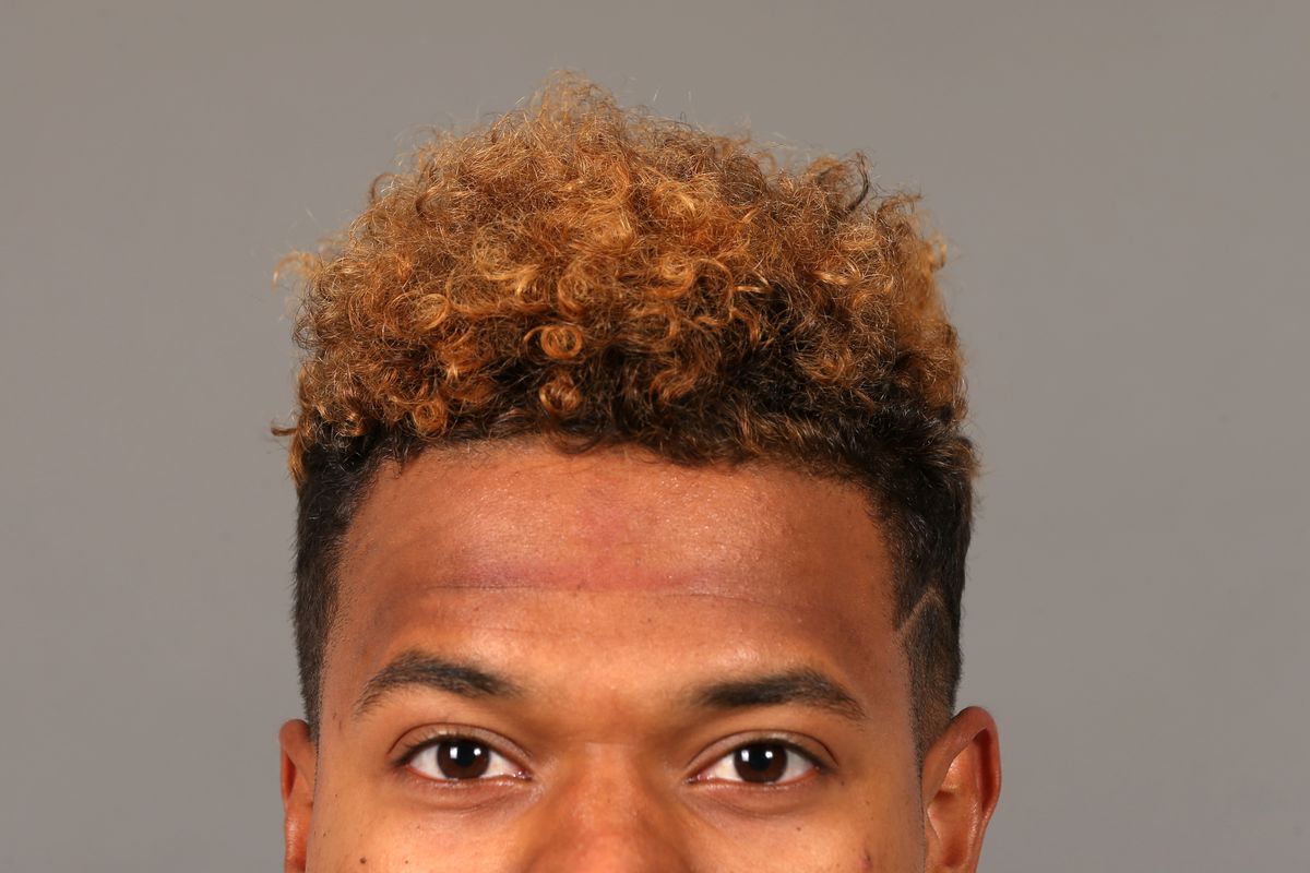It's no that I've cropped this photo, Rob Carr actually zoomed in on Stroman's hair because it is glorious.