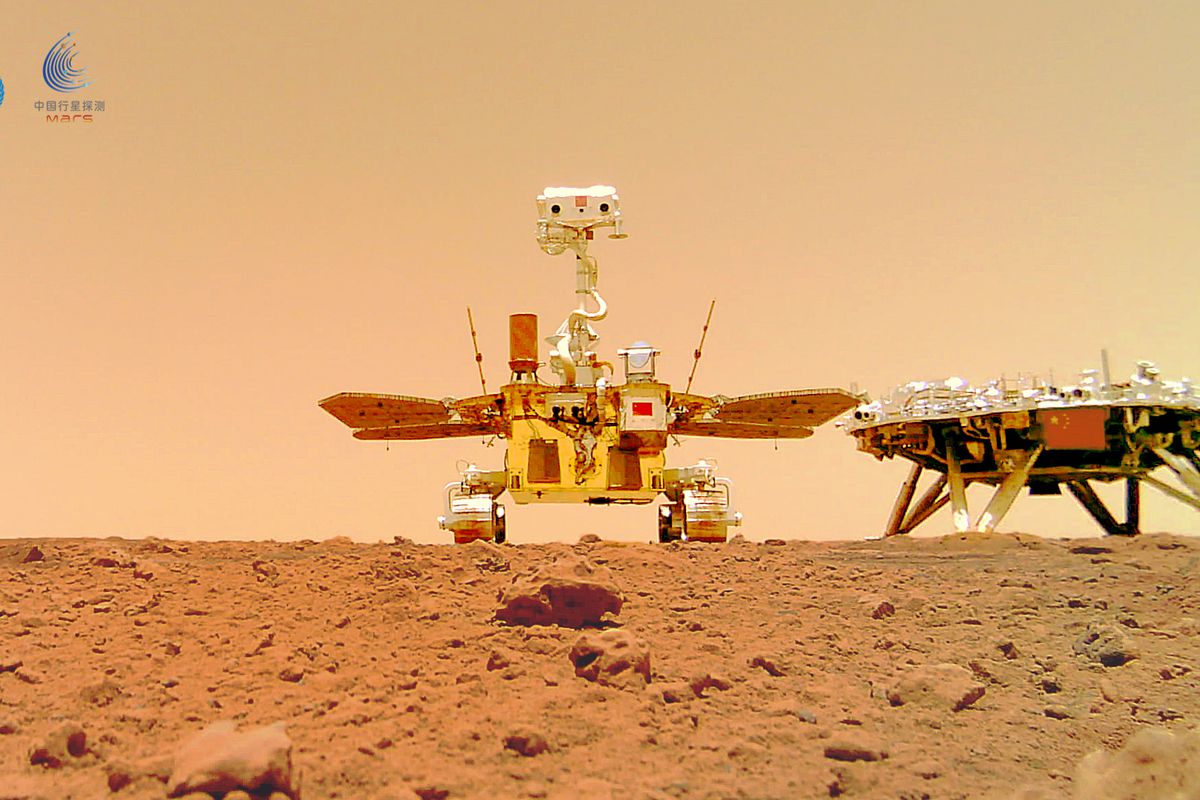 China’s Zhurong rover on the surface of Mars, next to its landing platform.