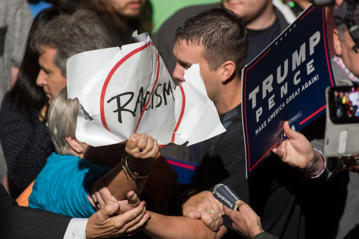 A protester is removed from a Trump rally, in October.