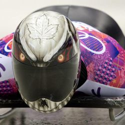 Eric Neilson of Canada starts his first run during the men's skeleton competition at the 2014 Winter Olympics, Friday, Feb. 14, 2014, in Krasnaya Polyana, Russia.