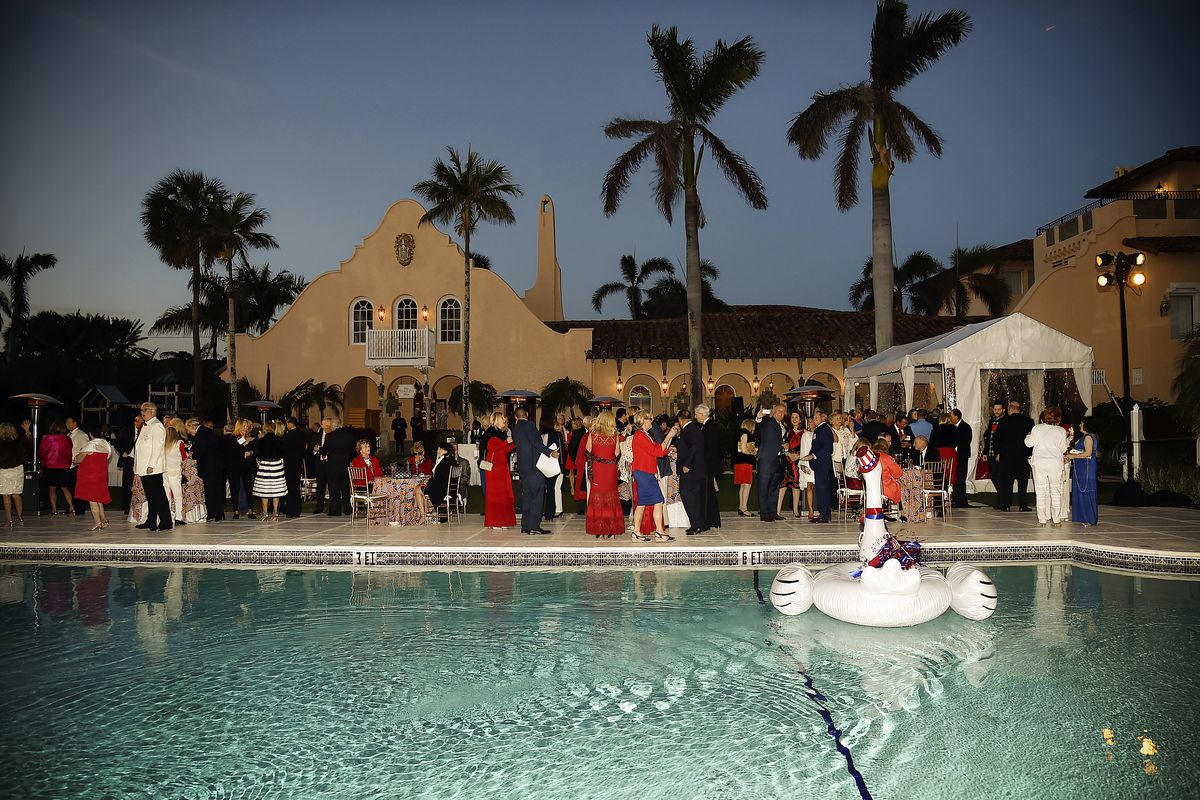 Guests around the pool at President Trump's one year anniversary with over 800 guests at the winter White House at Mar-a-Lago on January 18, 2018 in Palm Beach, Florida.  (Photo by Patrick McMullan/Patrick McMullan via Getty Images)