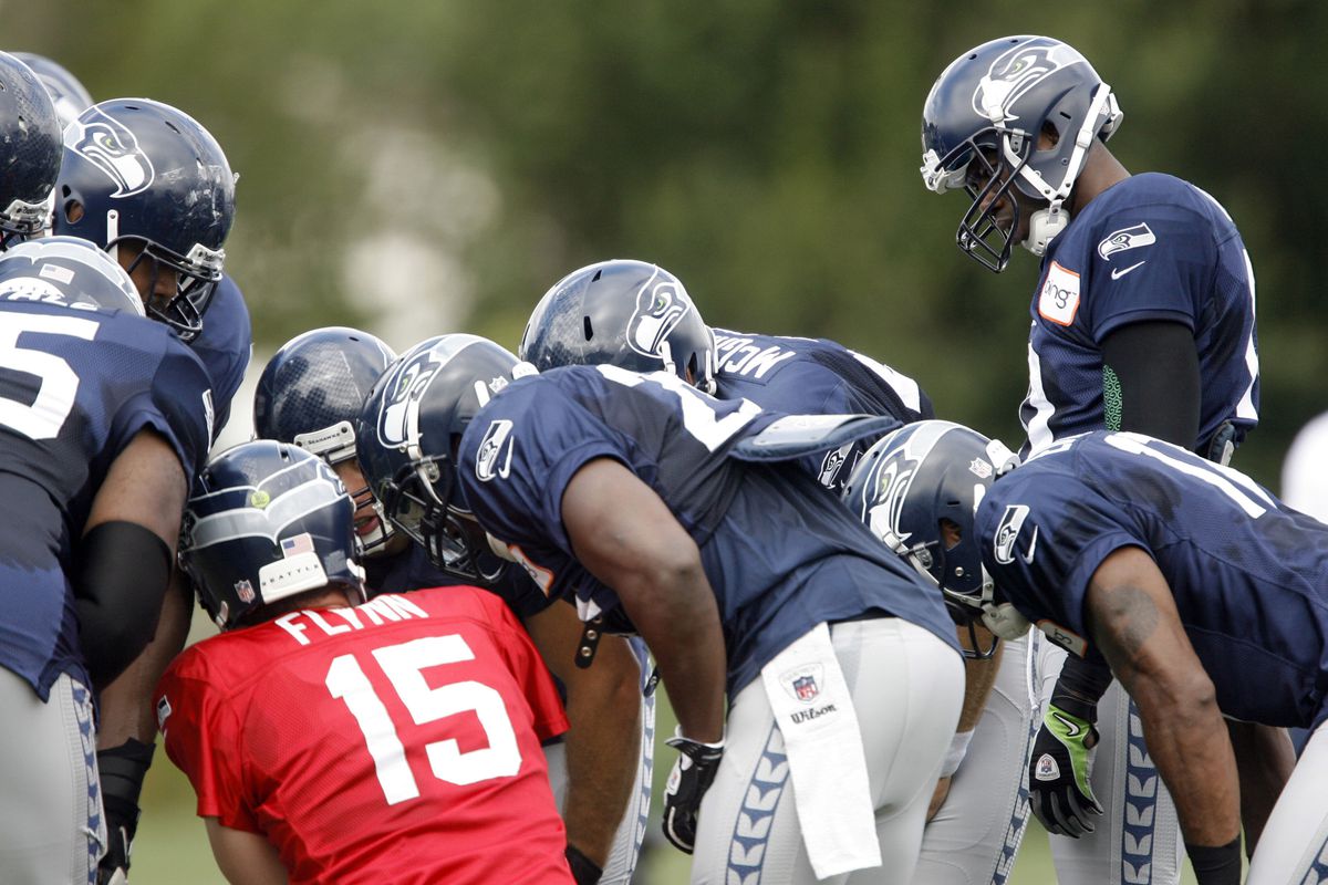 Aug 8, 2012; Renton, WA, USA; NFL: Seattle Seahawks wide receiver Terrell Owens (10) listens to a play call in the huddle during a training camp scrimmage at the Virginia Mason Athletic Center. Mandatory Credit: Joe Nicholson-US PRESSWIRE