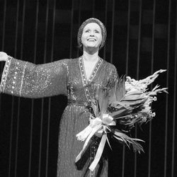 FILE- In this March 8, 1983, file photo, actress Debbie Reynolds returns for a curtain call after a performance of "Woman of the Year" at New York's palace theatre. Reynolds, star of the 1952 classic "Singin' in the Rain" died Wednesday, Dec. 28, 2016, according to her son Todd Fisher. She was 84. 