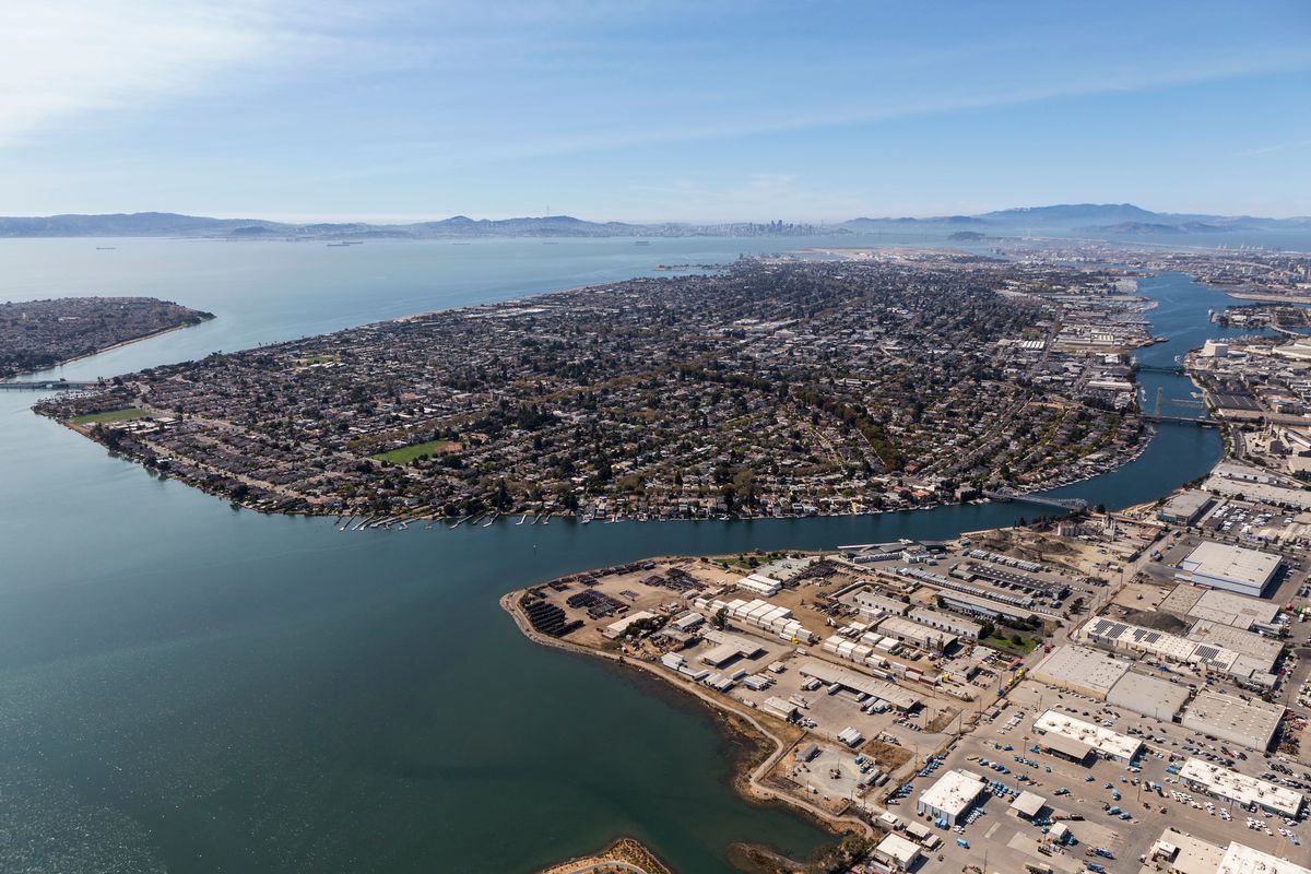 Aerial view of Alameda Island during a sunny day, with Oakland to the right.