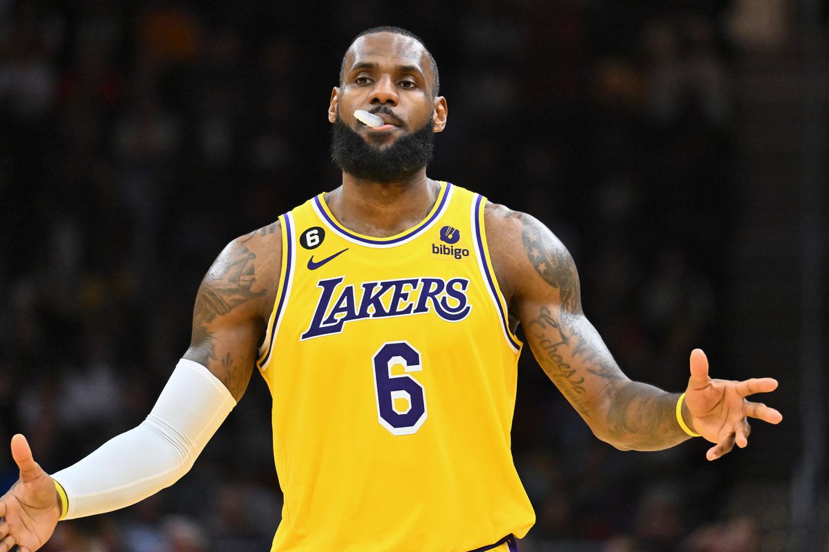 LeBron James #6 of the Los Angeles Lakers shrugs in reaction during the third quarter against the Cleveland Cavaliers at Rocket Mortgage Fieldhouse on December 06, 2022 in Cleveland, Ohio. The Cavaliers defeated the Lakers 115-100