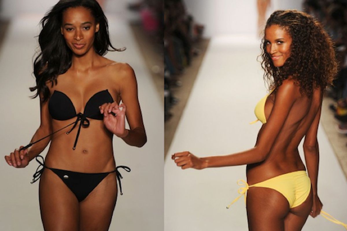 Just what we need: a bathing suit made of adhesive. Image via <a href="http://racked.com/archives/2011/07/19/the-models-who-walked-in-the-perfect-tan-bikini-show-demonstrate-how-the-bathing-suits-stick-on-with.php">Racked</a>
