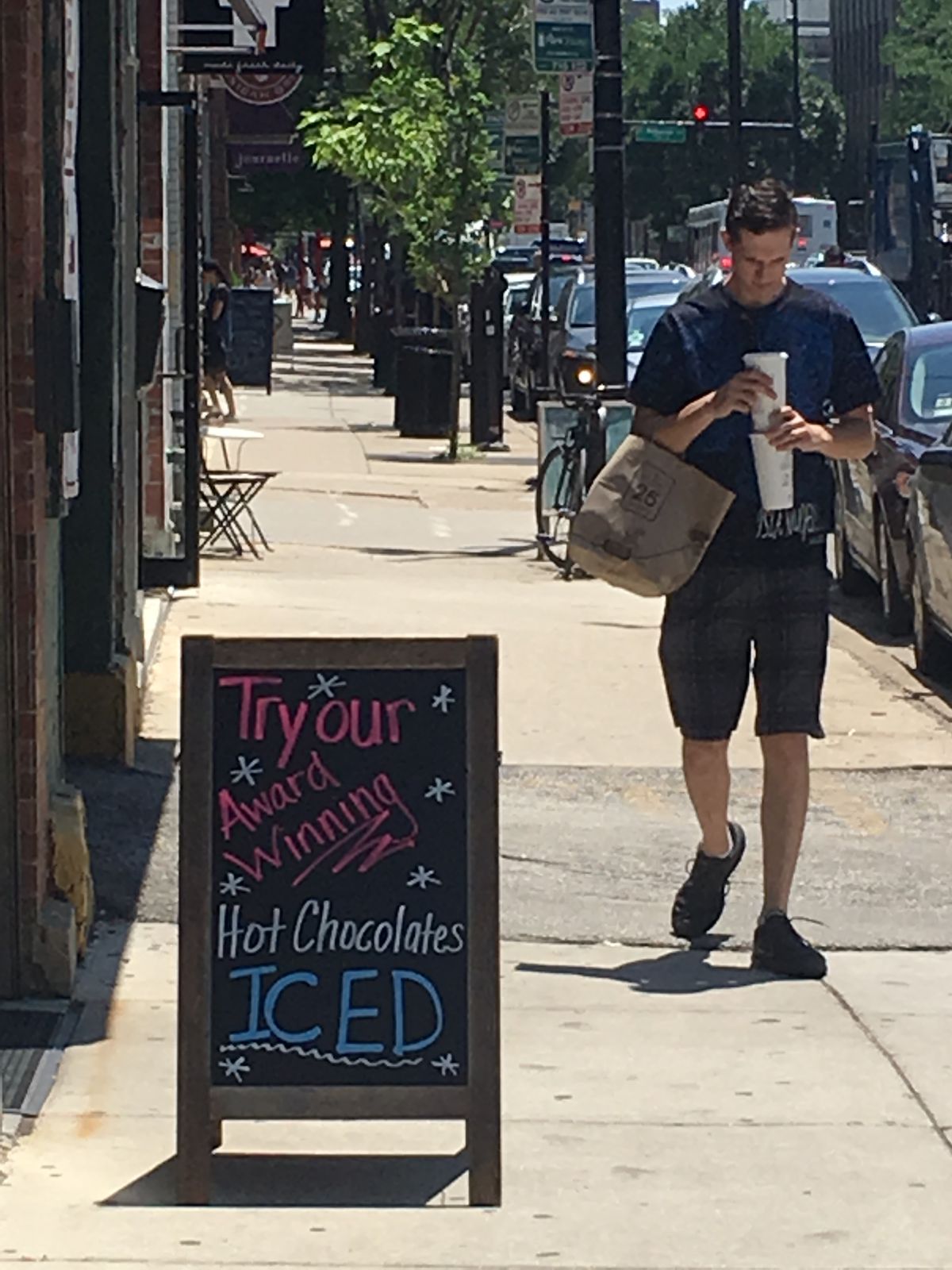 A sign outside Mindy’s Hot Chocolate, a restaurant in Bucktown. “We’re all obsessed with it, we change it every day,” said general manager Brooke Bartlett | Adam Thorp/Sun-Times