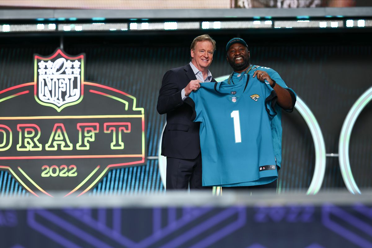 Commissioner Roger Goodell of the NFL presents number one pick Travon Walker of the Jacksonville Jaguars in the NFL football draft during round one of the 2022 NFL Draft on April 28, 2022 in Las Vegas, Nevada.