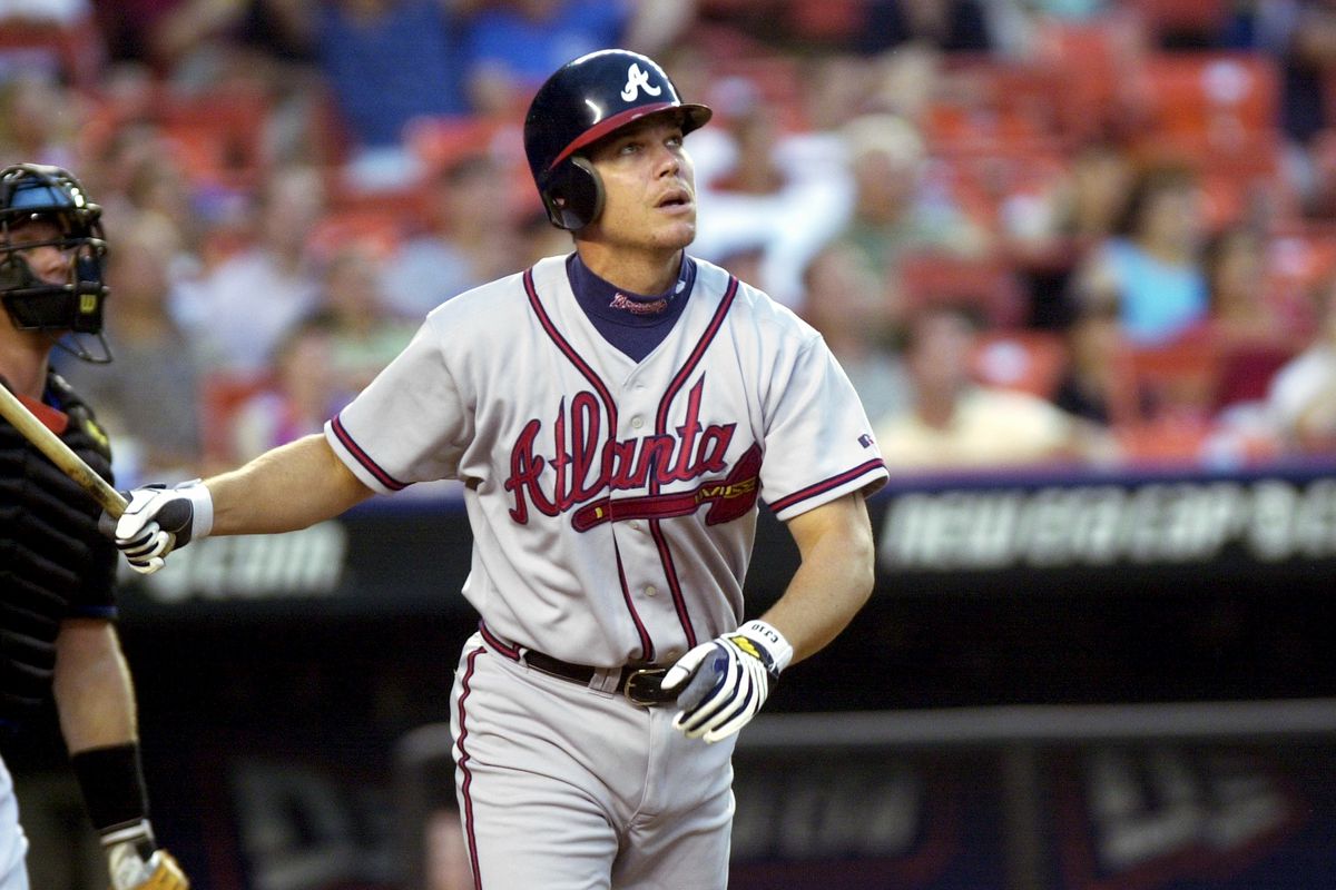 Atlanta Braves’ Chipper Jones hits a three-run homer in the