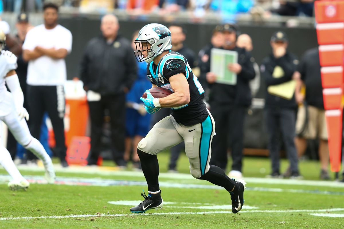 Carolina Panthers running back Christian McCaffrey runs after a catch against the New Orleans Saints during the second quarter at Bank of America Stadium.