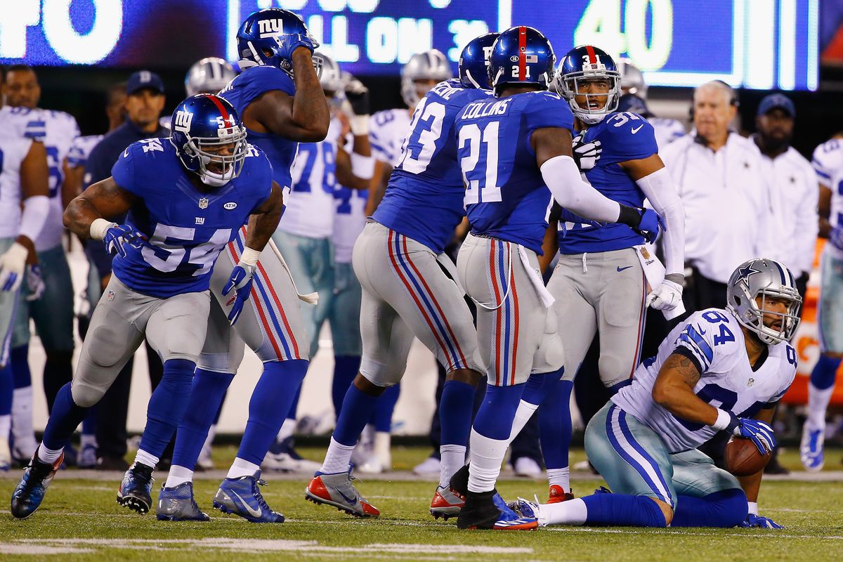 The Giants after stopping James Hanna of Dallas on fourth down late in Sunday's game