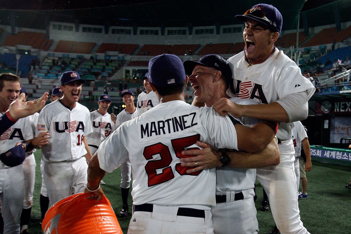 Ya, I dug deep to find this picture of Cardinal 4th round draft pick Jeremy Martinez in his under-18 Team USA days. That's him celebrating their world championship with manager Scott Brosius.