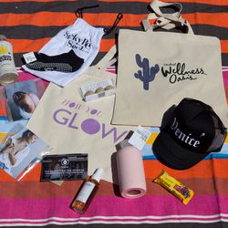 Our epic gift bag featured Haati Chai and Amarilo jewelry, OUAI's wave spray, BKR's glass bottles, Pure Organic ancient grain bars, Electric & Rose hats, Goodbites blonde macaroons, StickyBe socks, Detoxwater, and a How You Glow tote.