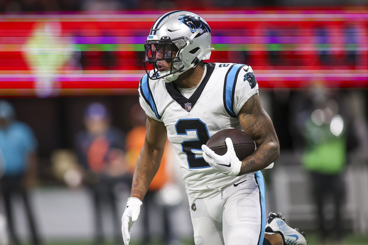 Carolina Panthers wide receiver DJ Moore (2) runs with the ball against the Atlanta Falcons in the second quarter at Mercedes-Benz Stadium.