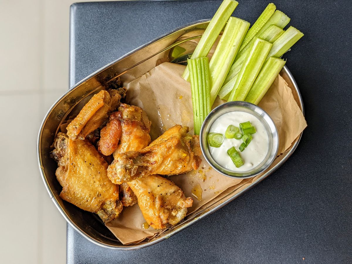 Lemon pepper wings with celery only since they were out of carrot sticks at Topgolf El Segundo.