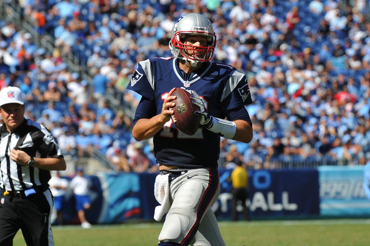 Sep 09, 2012; Nashville, TN, USA; New England Patriots quarterback Tom Brady (12) rolls out to pass against the Tennessee Titans during the second half at LP Field. The Patriots beat the Titans 34-13. Mandatory credit: Don McPeak-US PRESSWIRE