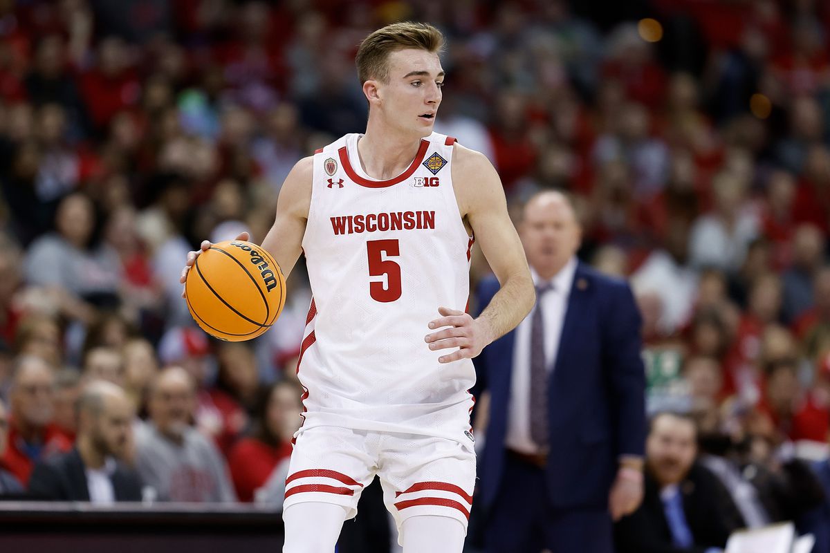 Tyler Wahl #5 of the Wisconsin Badgers dribbles up court during the first half of the game against the Liberty Flames in the second round of the NIT Men’s Basketball Tournament at Kohl Center on March 19, 2023 in Madison, Wisconsin.