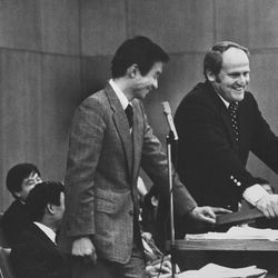 Shuichi Yaginuma interprets for BYU head football coach LaVell Edwards during a fireside in Tokyo Dec. 31, 1977.