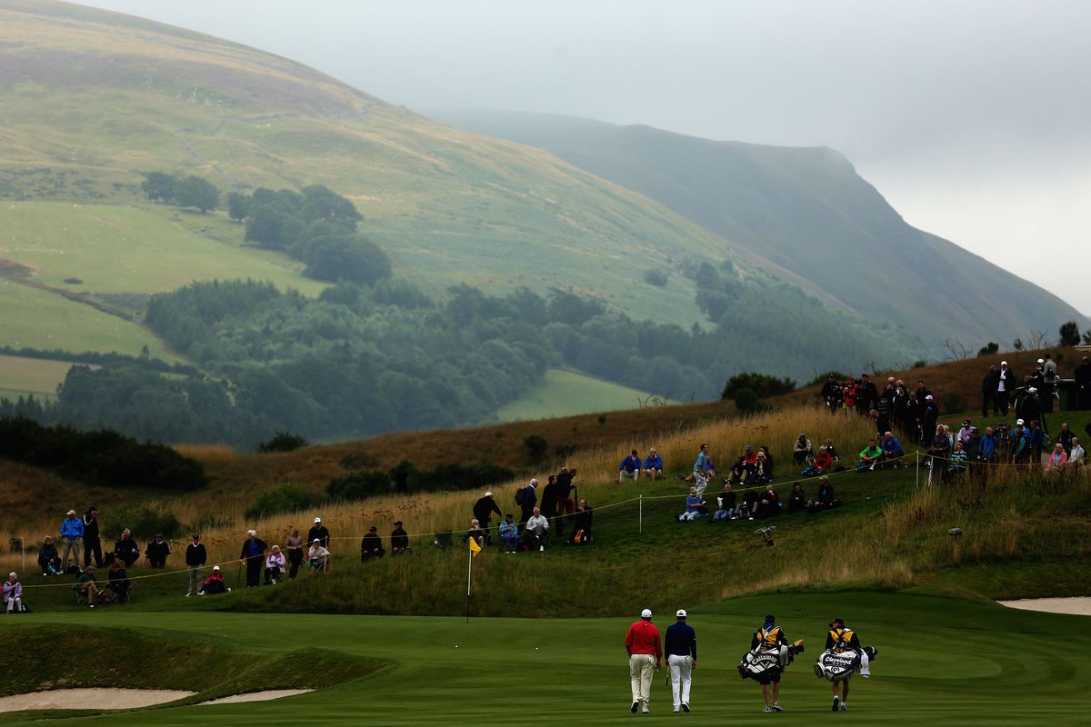  Players are pictured against the mountain backdrop during the first round of the Johnnie Walker Championship at Gleneagles on August 22, 2013 in Auchterarder, Scotland.
