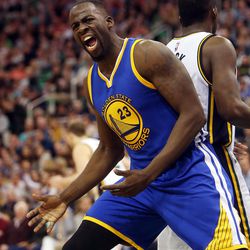 Golden State Warriors forward Draymond Green (23) yells for a foul after making a basket in the second half of an NBA regular season game against the Utah Jazz at the Vivint Arena in Salt Lake City, Wednesday, March 30, 2016.