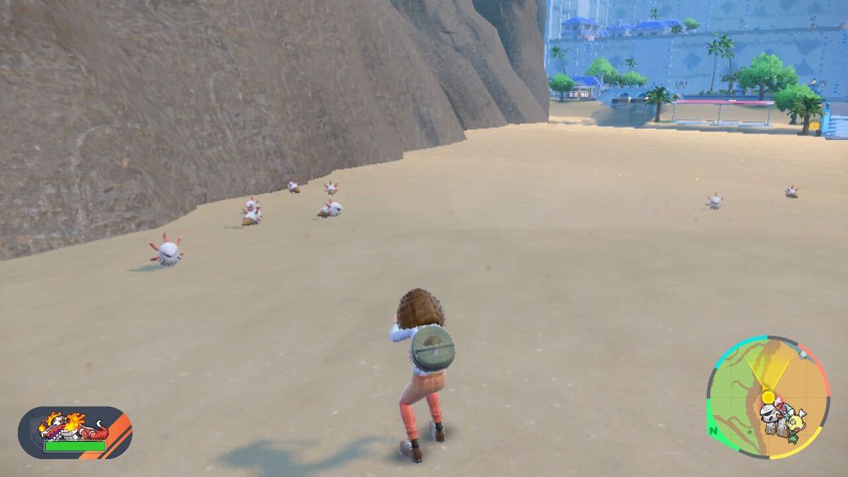 An image of a trainer walking around in a desert in Pokémon Scarlet and Violet. There are 8 little Larvesta walking around the area.