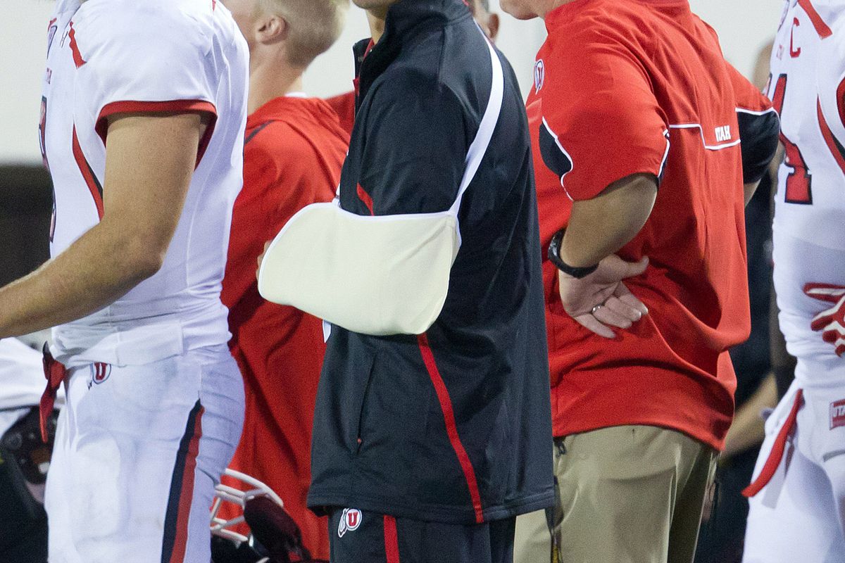 Utah quarterback Jordan Wynn (middle) was forced to retire after injuring his shoulder last week. Without him, the Utes could be in trouble against rival BYU.