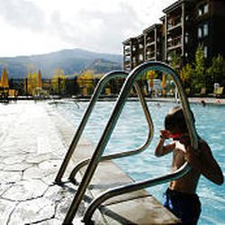Spencer Larsen, 7, takes a dip in the swimming pool at his family's timeshare at Westgate Park City Resort and Spa.