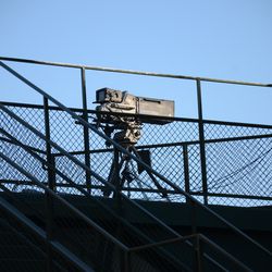 Sun 4:03 p.m. Broadcast camera set up in the left field corner of the bleachers - 