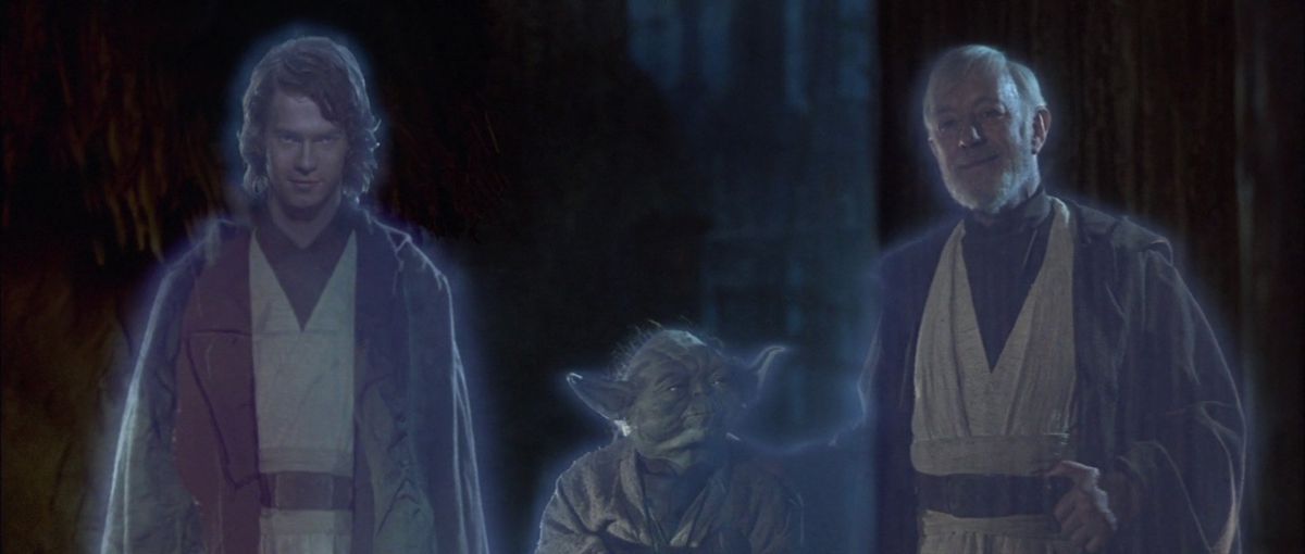 ghost anakin, ghost yoda, and ghost obi-wan kenobi watch the emoks sing yub nub in Star Wars: Return of the Jedi