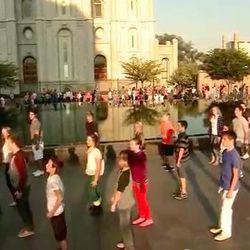 Young men and young women of the South Jordan River Stake perform a flash mob at Temple Square.