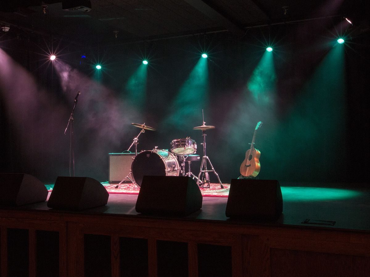 A stage with music instruments.