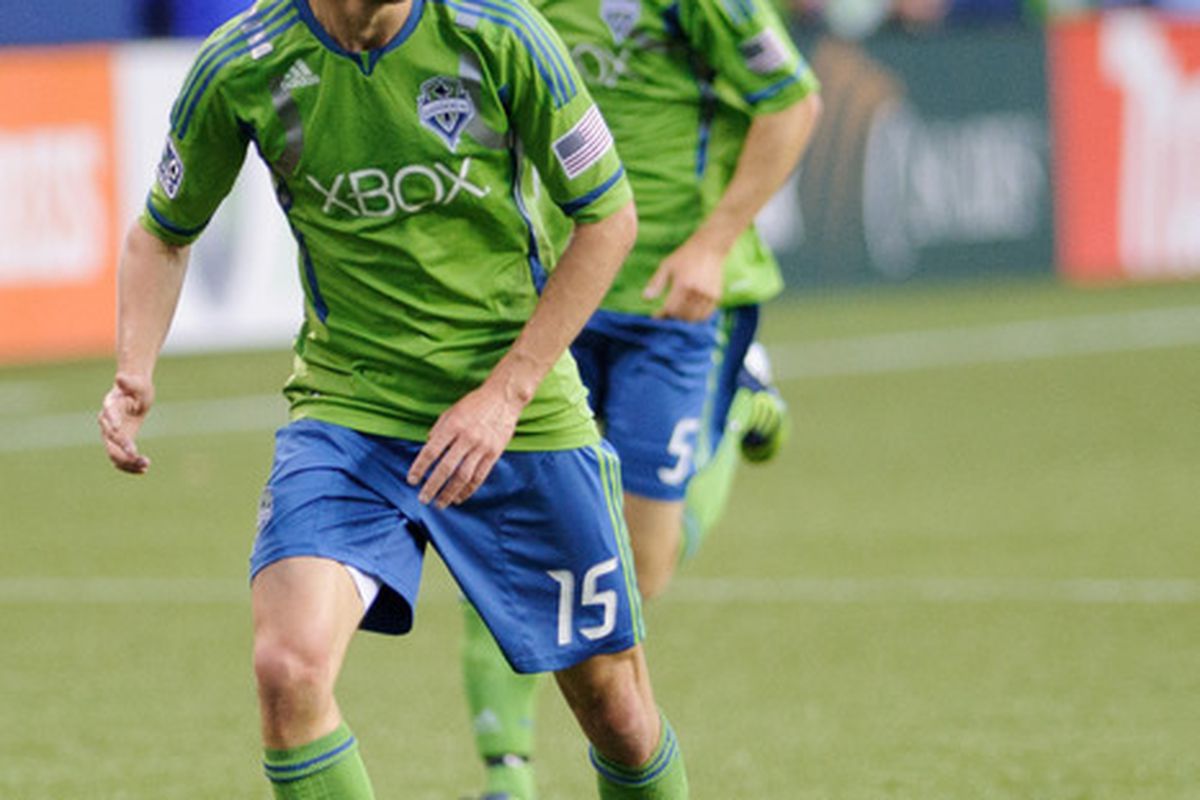 May 23, 2012; Seattle, WA, USA; Seattle Sounders FC midfielder Alvaro Fernandez (15) looks for an open teammate during the 1st half against the Columbus Crew at CenturyLink Field. Mandatory Credit: Steven Bisig-US PRESSWIRE