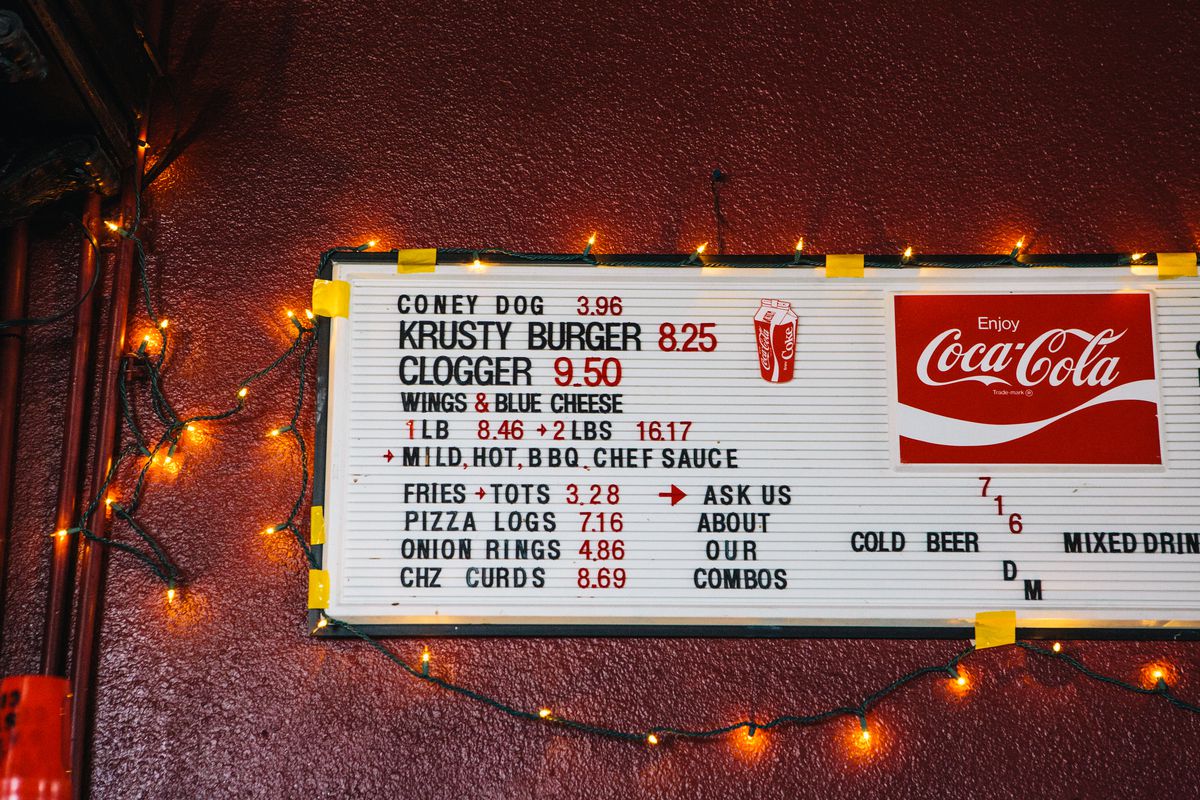 Delray Cafe’s menu featuring the Krusty Burger and the Clogger