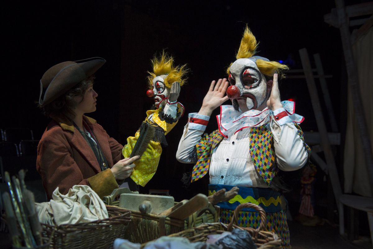 Sarah Cartwright (left) is Charlotte, with Joey Steakley as Joey the Clown, and a hand puppet by Jesse Mooney-Bullock in The House Theatre of Chicago production of “A Comedical Tragedy for Mister Punch.” (Photo: Michael Brosilow)